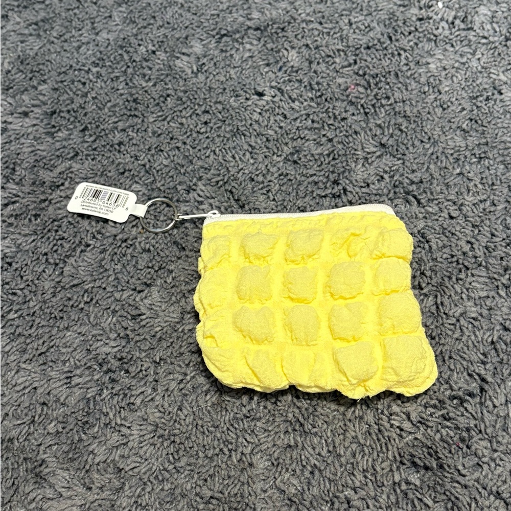 NWT yellow pillowy puffy zipper keychain pouch